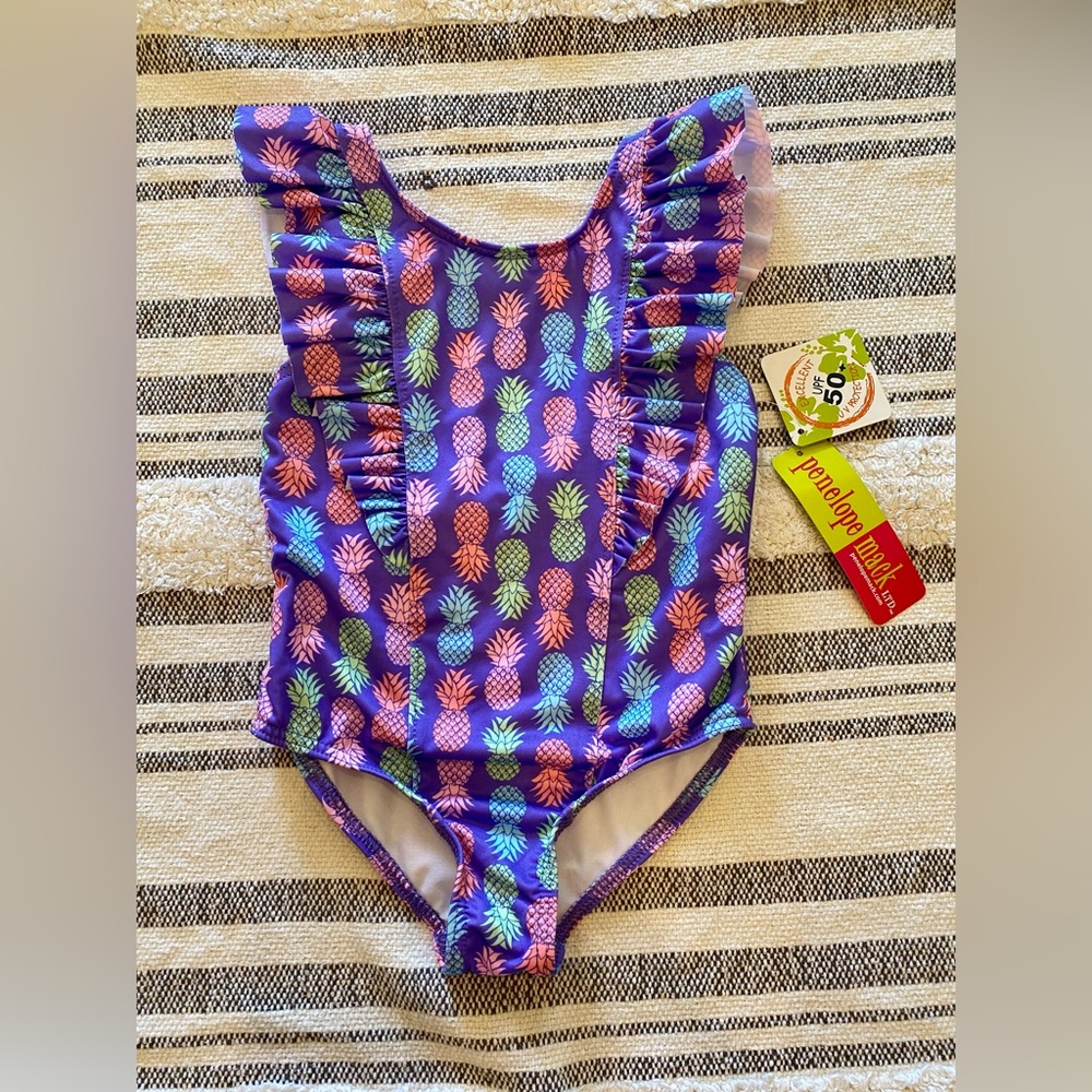 Girl’s size 4 pineapple swimsuit. NWT!